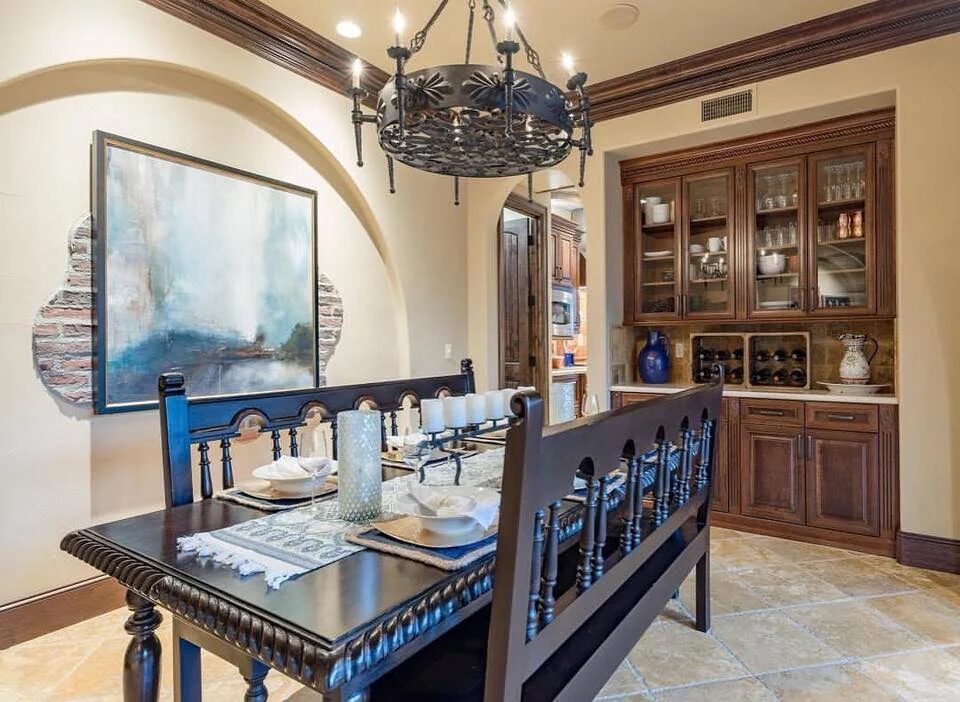 Dining room with arched built-in china hutch