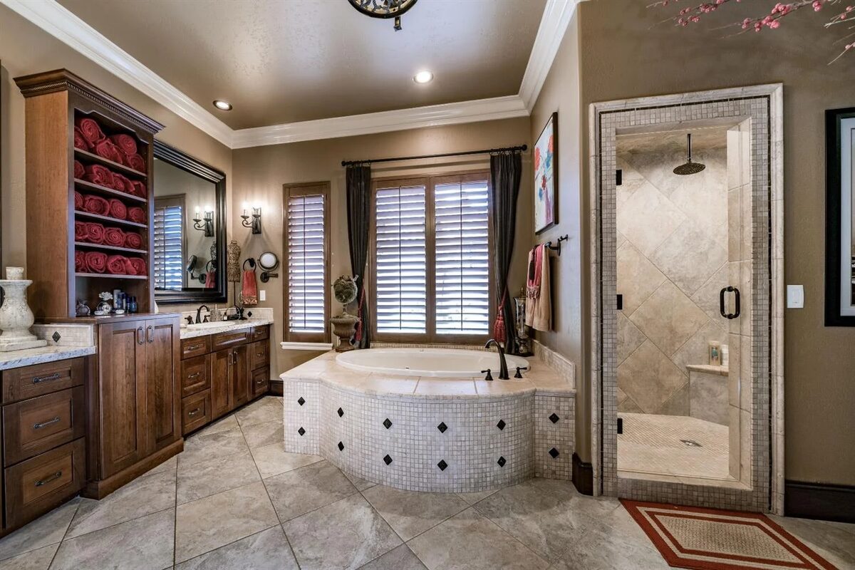 Bathroom with soaking tub, shower and custom vanity cabinetry