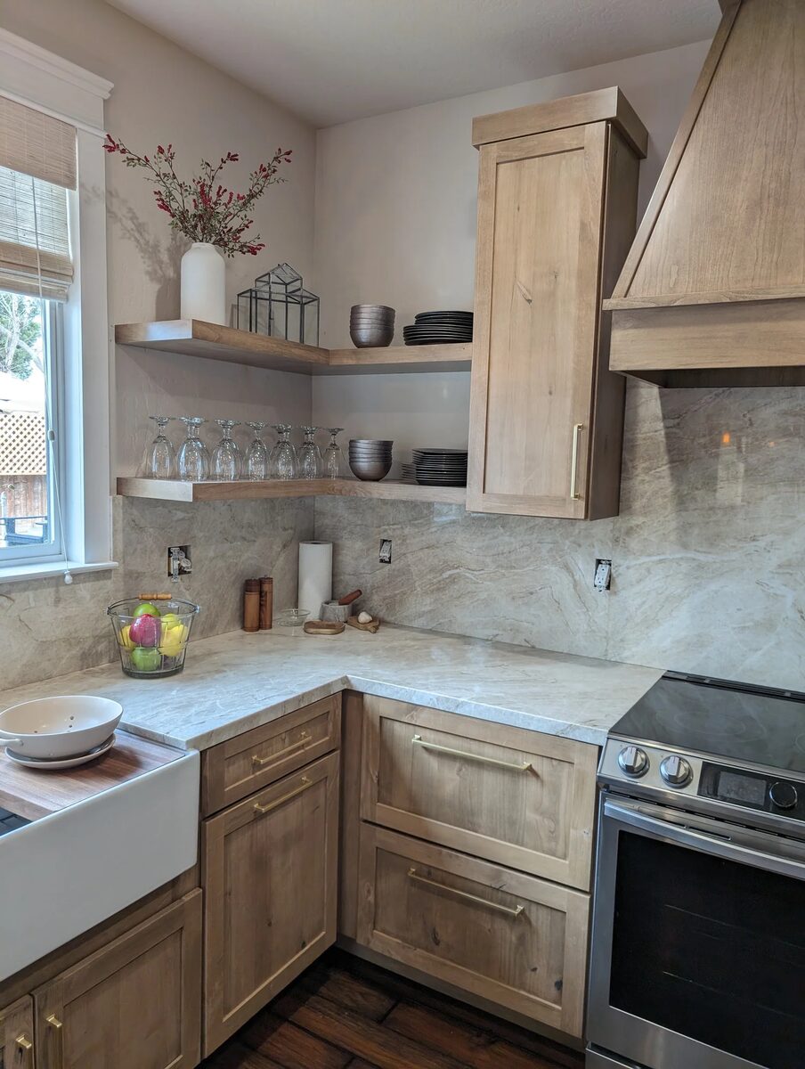 Weathered wood corner kitchen with open shelves