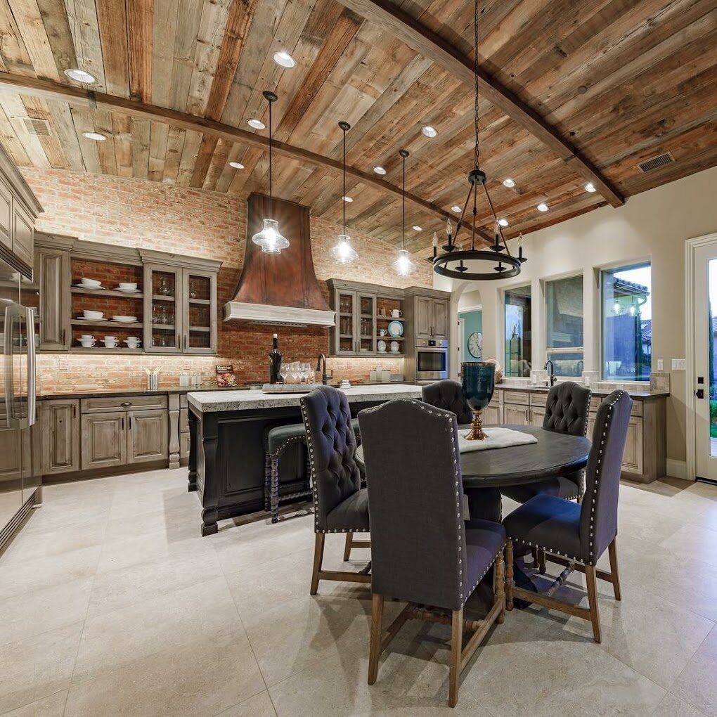 Open kitchen and dining great room with brick barrel ceiling